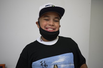 caption: Fifth-grader Miles Jenkins talked with Gerald Donaldson, family support worker at Leschi Elementary School, about his feelings on Donald Trump and the elections.