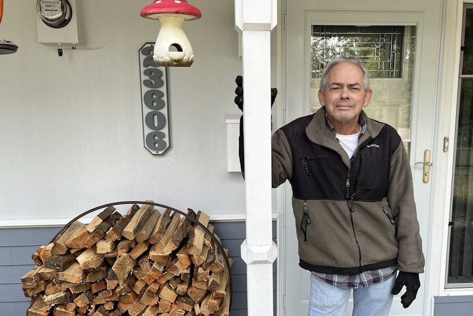 caption: Dennis Buskeness lives on land zoned for new apartment buildings in the middle of Mountlake Terrace's planned Town Center