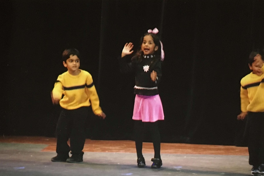 caption: A childhood photo of Evon Mahesh, Bollywood dancing. Evon later became uncomfortable doing hyper-feminine dance moves and wearing traditionally girly costumes.