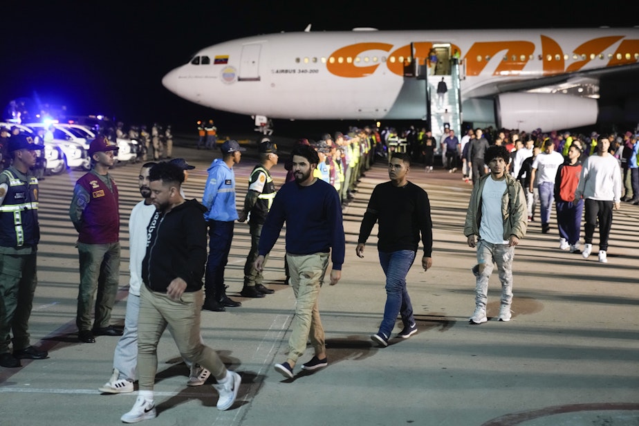 caption: Venezuelan migrants deported from the United States arrive at Simon Bolivar International Airport in Maiquetia, Venezuela, Monday, March 24, 2025.