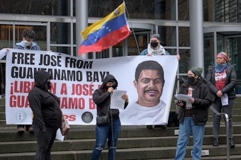 caption: The sister (left front), and wife (center front) of Jose Gregorio Medina Andrade read to the public their statements about their relative at the steps of the U.S. District Court in Seattle. Jan. 16th.  