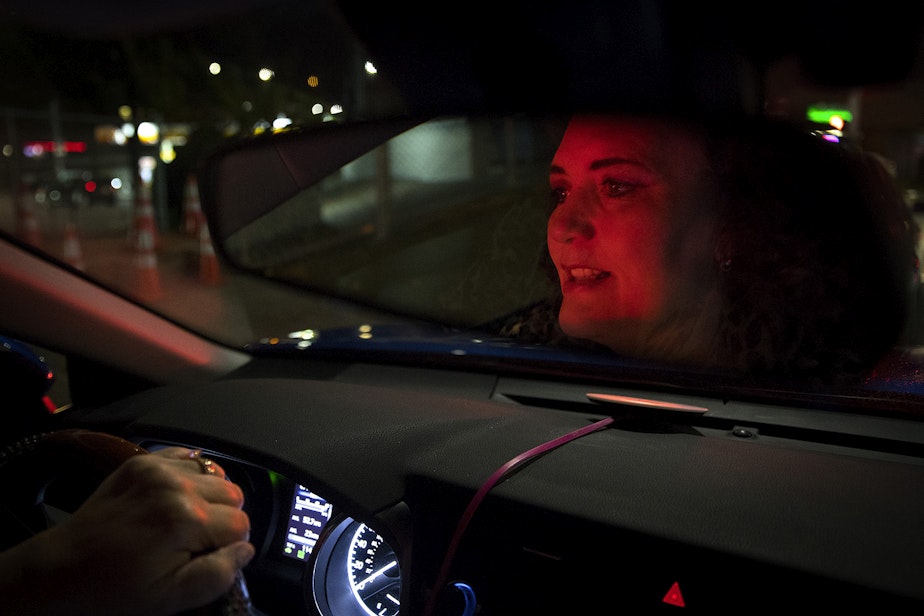 caption: Melinda Miner drives for Uber at 8:36 p.m. on Tuesday, September 10, 2019. She works for Lyft, too.