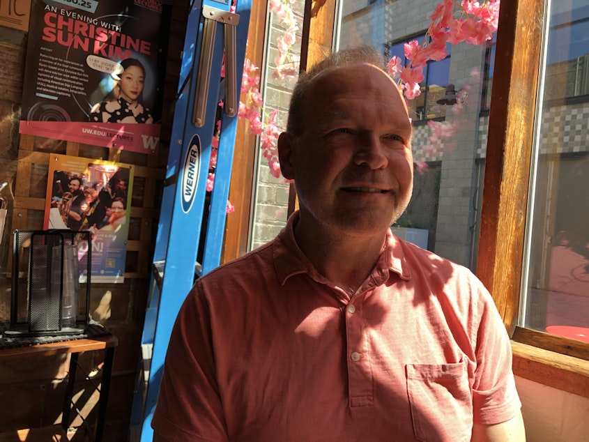 caption: Chris Peterson, co-owner of Cafe Allegro, Seattle's original coffeehouse.