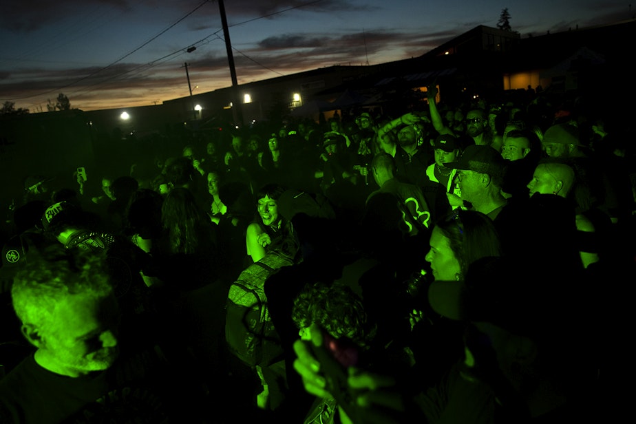 caption: A crowd dances as the The Chaotic Noise Marching Corps, a renegade punk brass band, performs at the 28th annual Dead Baby Down Hill, on Saturday, August 3, 2024, at the Hazard Factory in South Park.