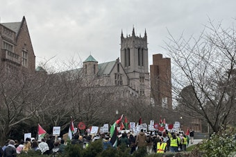 caption: Protesters with Palestinian flags on the UW campus on Tuesday, March 18, 2025, after Israel shattered a ceasefire and reportedly killed 400 Palestinians overnight.