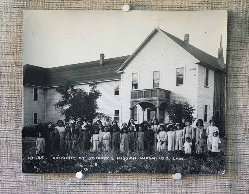 caption: A photograph from 1913 is shown on Thursday, July 20, 2017, at St. Mary’s Catholic Mission in Omak.