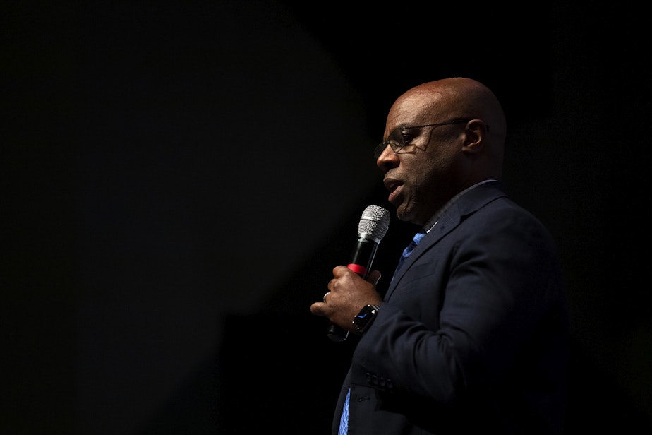 caption: Seattle Public Schools Superintendent Brent Jones discusses a proposed plan to close 20 elementary schools on Tuesday, May 28, 2024, at Roosevelt high school in Seattle.