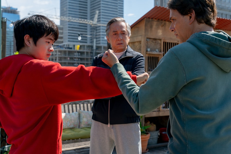 caption: (L-R) Ben Wang, Jackie Chan, and Ralph Macchio star in 2025's "Karate Kid: Legends."