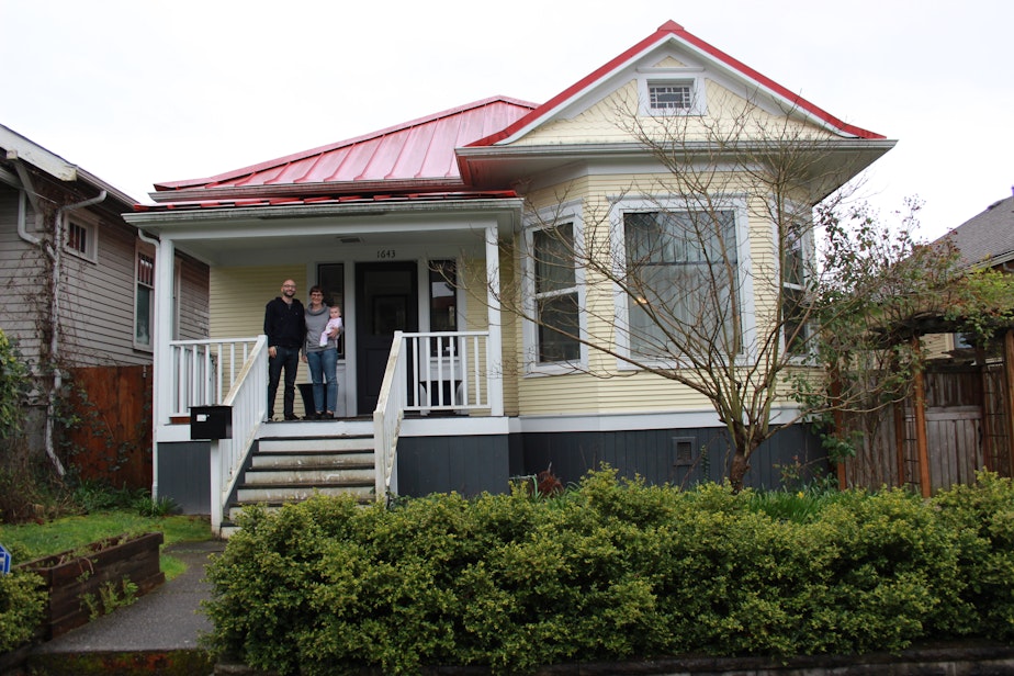 caption: Aaron, Kate and Margo Zeichner at the King Street house where they have lived for three years.