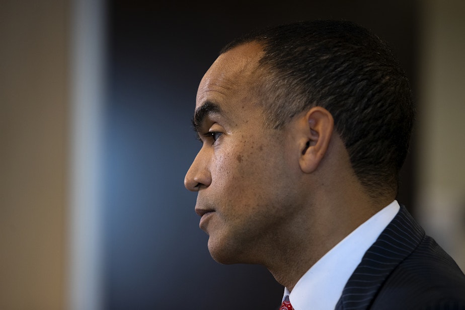 caption: Washington Attorney General Nick Brown addresses members of the press after filing a lawsuit against President Donald Trump’s executive order on birthright citizenship, on Tuesday, January 21, 2025, at the Attorney General’s Office in Seattle.