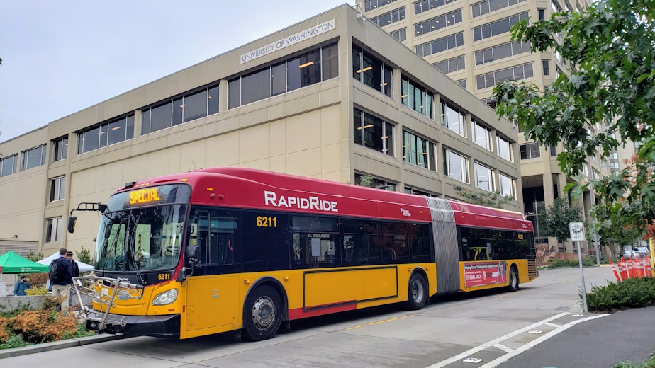 caption: A King County Metro RapidRide in the U District on Tuesday, October 8, 2024.