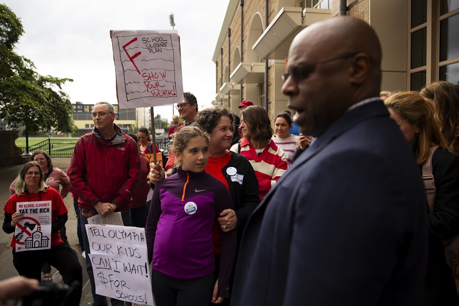 caption: Parents confront Seattle Public Schools Superintendent Brent Jones before a ‘Well Resourced-Schools Community Meeting’ on Tuesday, May 28, 2024, at Roosevelt high school in Seattle.