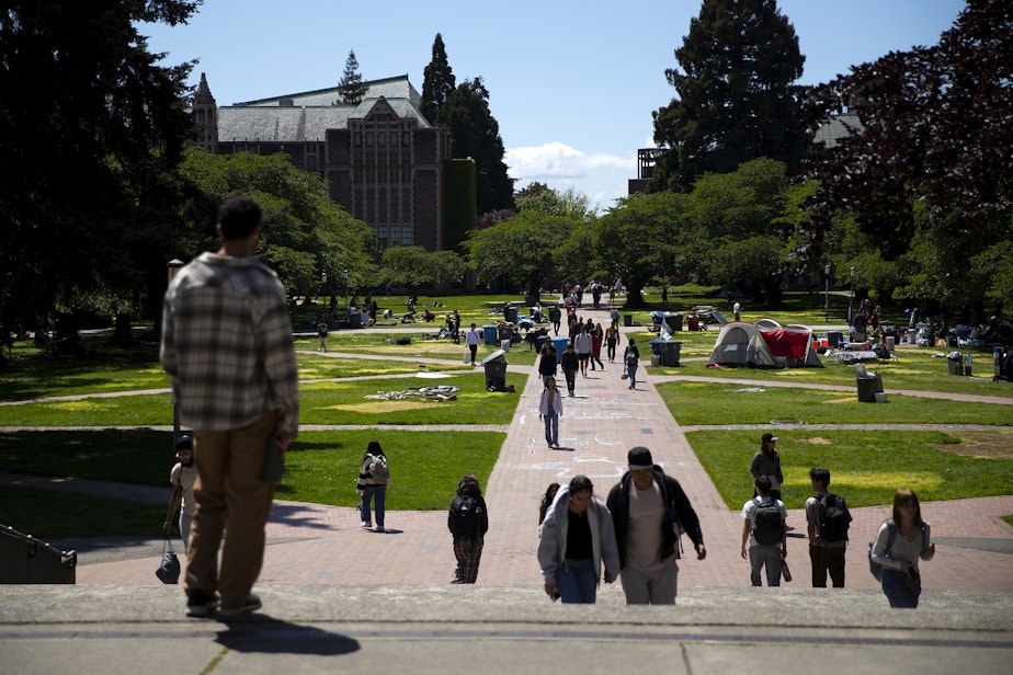 caption: Imprints of tents are visible ahead of the 3 p.m. deadline for students and protesters to remove the pro-Palestinian encampment on Monday, May 20, 2024, on the University of Washington campus Quad in Seattle.