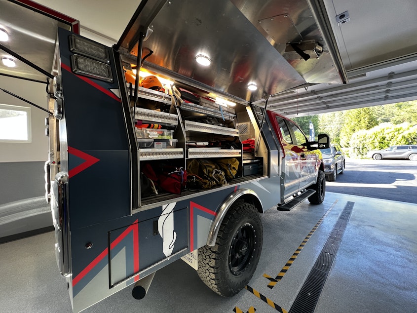 caption: Seattle Mountain Rescue truck’s equipment neatly organized and labeled into sections.