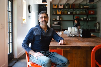 caption: Chef and cookbook author Omid Roustaei is portrayed on Wednesday, April 23, 2025, at The Pantry in the Ballard neighborhood of Seattle.
