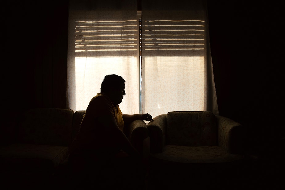caption: An unidentified community member is portrayed at his home on Monday, March 10, 2025, in Sunnyside, Washington.
