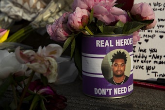 caption: A memorial for 17-year-old Garfield high school student Amarr Murphy-Paine continues to grow on the steps of the school, as seen during a unity walk of clergy and community members on Thursday, June 13, 2024, in Seattle. 