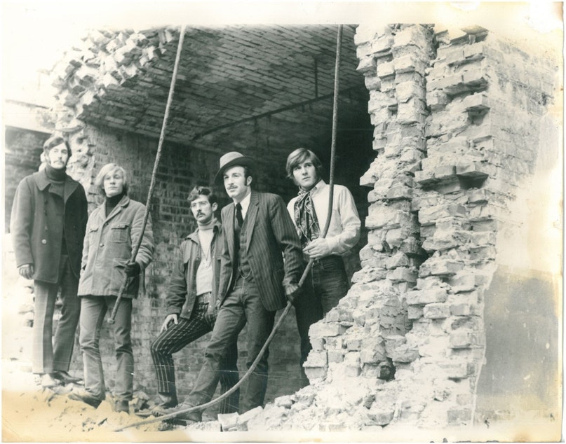 caption: Doug Paterson, wearing the hat, second from right, in a rock group when he was a young man. They were called "Consolidated Roq." Paterson died this month just shy of his 73rd birthday.
