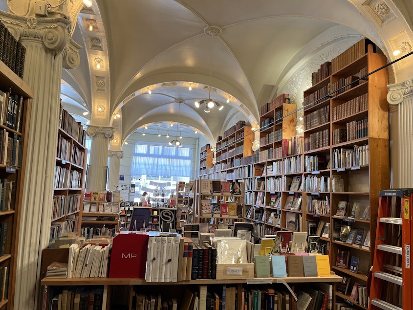 caption: The interior of Arundel Books, formerly a brewing company in Pioneer Square.