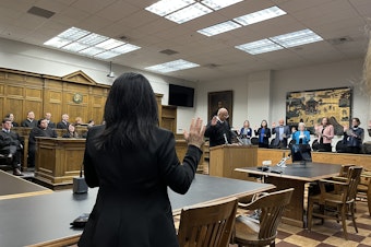 caption: At the King County Courthouse in downtown Seattle,  lawyers restated their oath to uphold the U.S. and Washington Constitutions on May 1, 2025. 