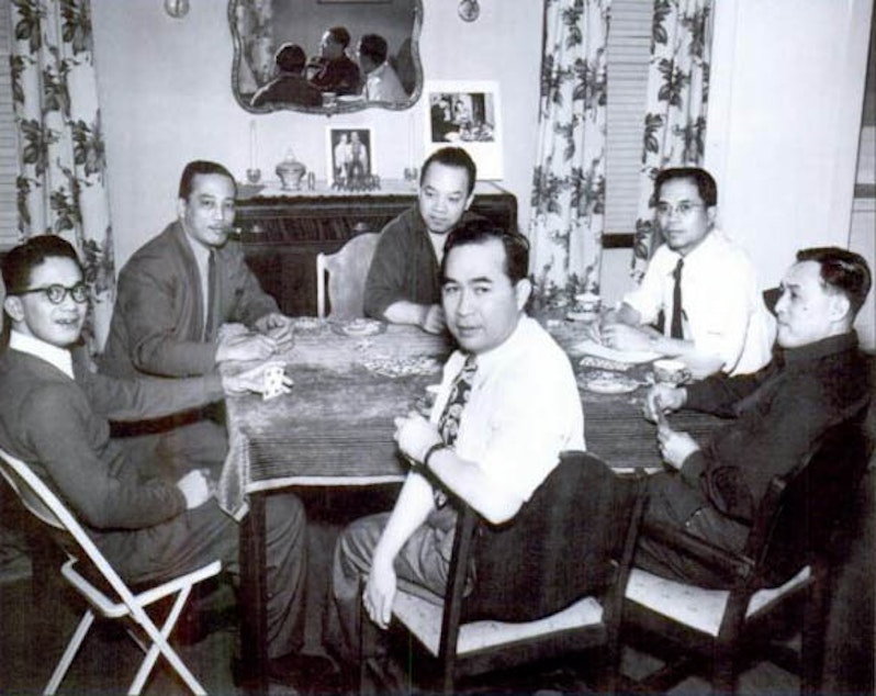 caption: Almanzor Guido is in the center at the back. He enjoyed bringing people together at his home.