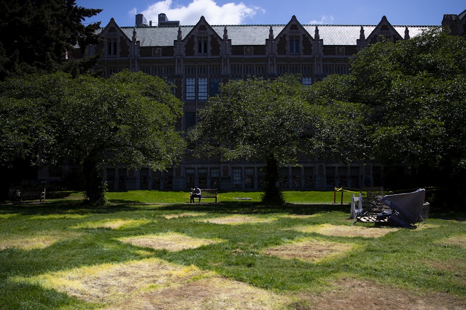 caption: Imprints of tents are visible ahead of the 3 p.m. deadline for students and protesters to remove the pro-Palestinian encampment on Monday, May 20, 2024, on the University of Washington campus Quad in Seattle.