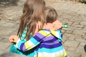 caption: Marlo Mack's daughter and her best friend.