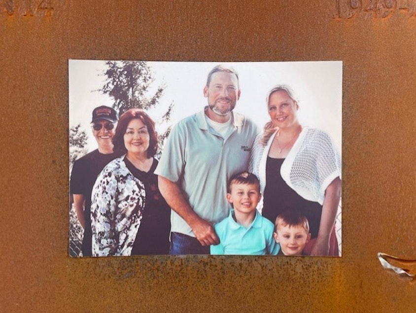caption: A panel at the Oso Slide Memorial is dedicated to remembering members of the Ruthven family, who were killed during the Oso landslide in 2014.