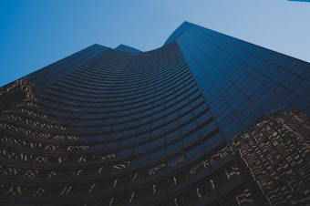caption: Columbia Center in downtown Seattle, where the federal Health and Human Services administration has their regional offices.
