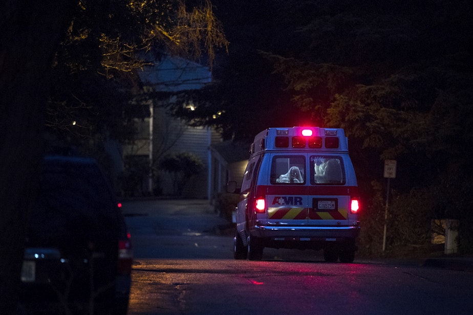 caption: An unidentified patient is transported to the hospital from the Life Care Center of Kirkland, the long-term care facility at the epicenter of the first coronavirus outbreak in the U.S., on Monday, March 2, 2020, in Kirkland.