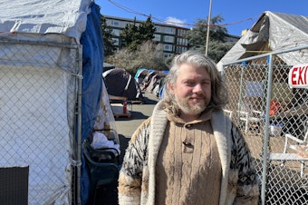 caption: Joe Molloy is running for mayor of Seattle. He is a resident of Tent City 3 and said the city is not treating homelessness "like the state of emergency that it is."