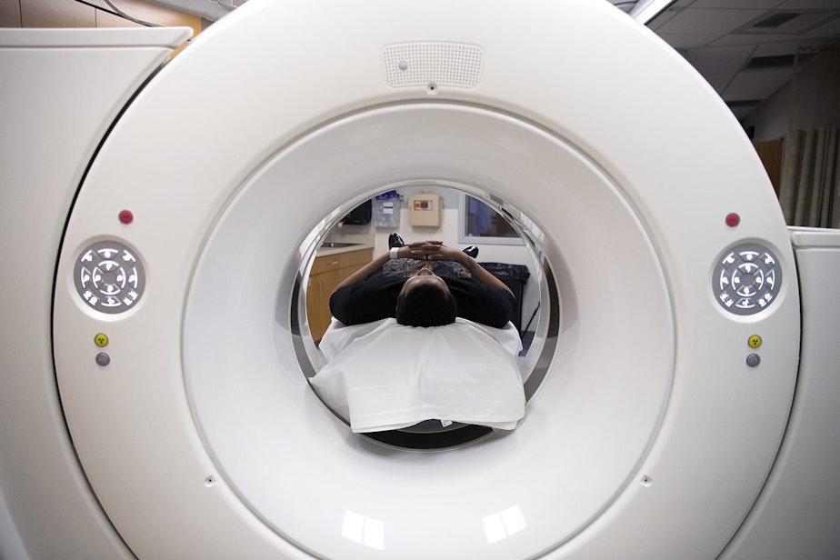 caption: DaShawn Horne has a CT scan on Wednesday, November 14, 2018, at Harborview Medical Center in Seattle.
