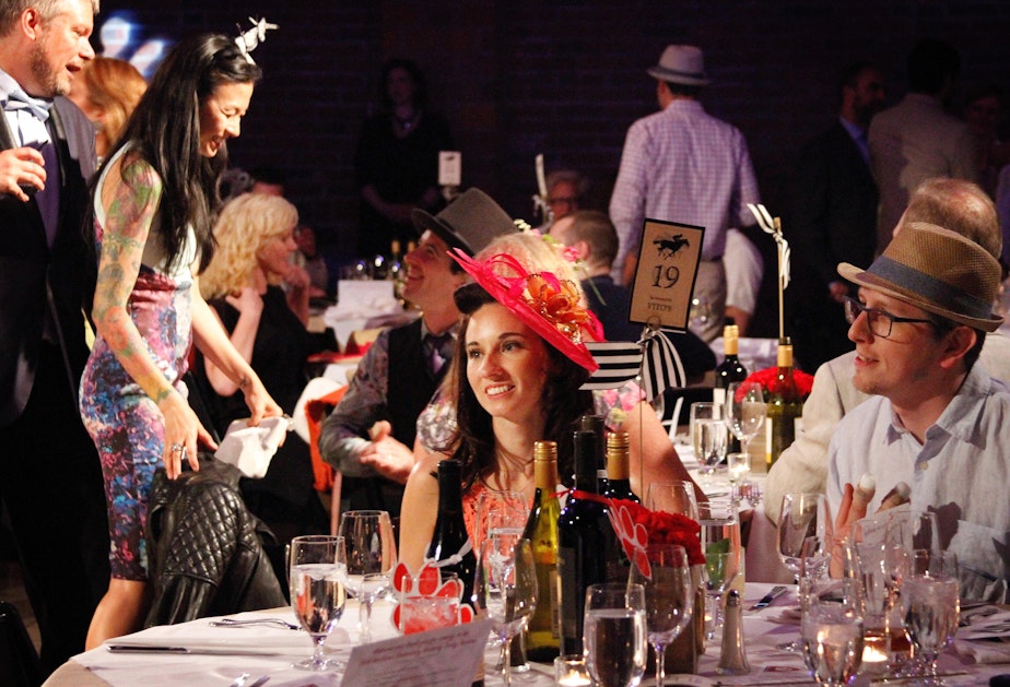 caption: Revelers at the McGilvra Elementary School Spring Auction on April 23, 2016. The auction brought in much of the $422,000 the school raised that year.