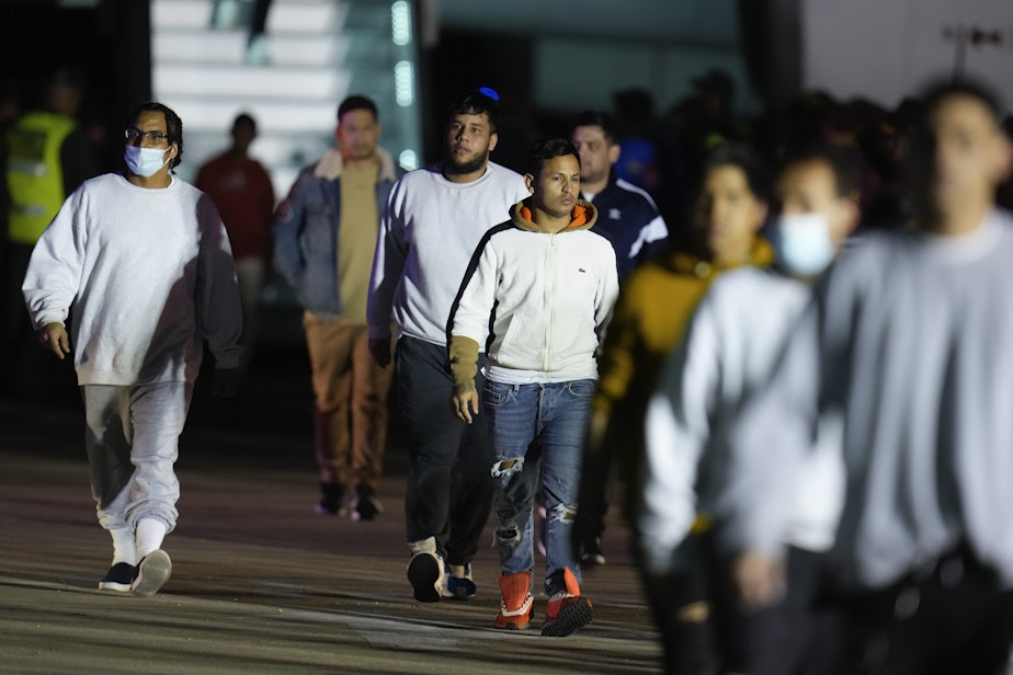 caption: Venezuelan migrants deported from the United States arrive at Simon Bolivar International Airport in Maiquetia, Venezuela, Monday, March 24, 2025.