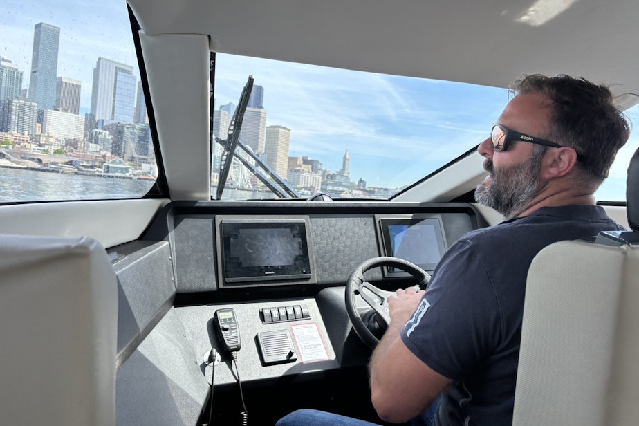 caption: An Artemis boat approaches Seattle