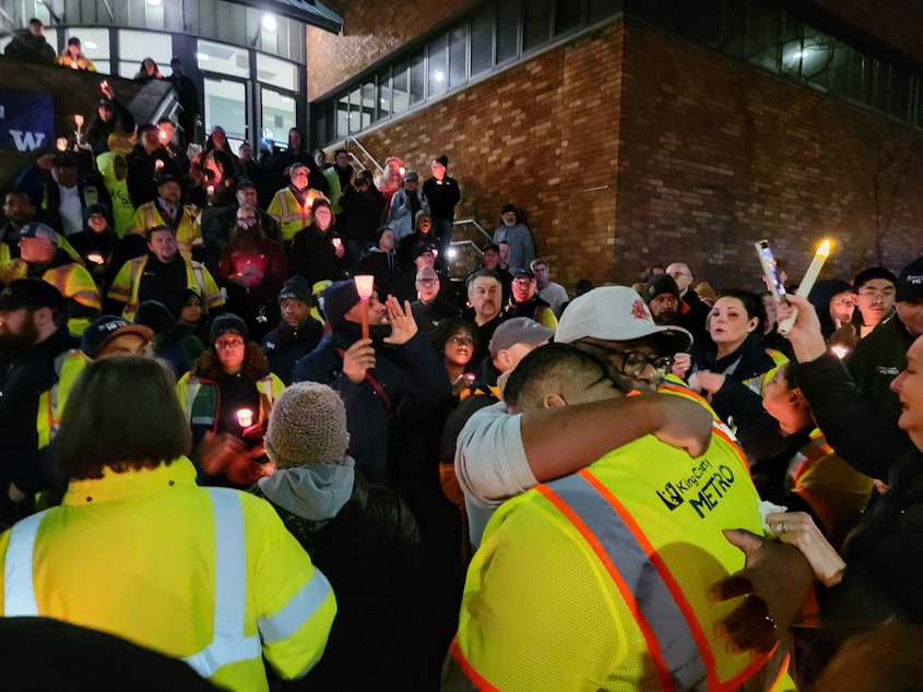 caption: Metro bus drivers gather at tribute to Shawn Yim on Dec. 21.