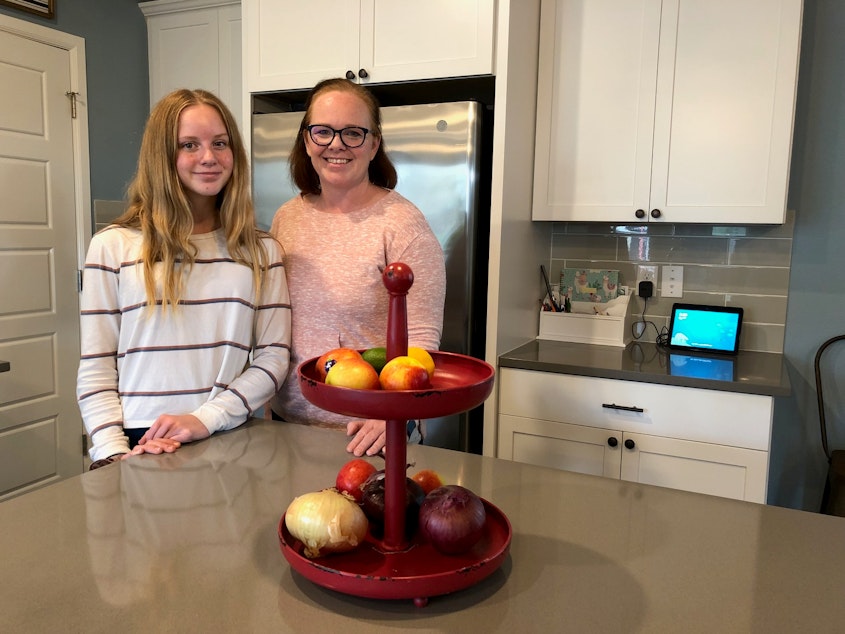 caption: Macy (L) and Kelli (R) Ferguson live in an Amazon smart home in Black Diamond, Washington.
