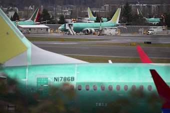 caption: Boeing 737 Maxes are shown on Monday, December 16, 2019, in Renton.
