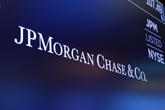 caption: JPMorgan Chase says it's having to put more money into reserve to cover bad loans.