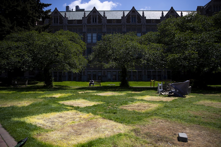 caption: Imprints of tents are visible ahead of the 3 p.m. deadline for students and protesters to remove the pro-Palestinian encampment on Monday, May 20, 2024, on the University of Washington campus Quad in Seattle.