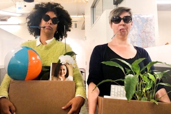 caption: Hosts Eula Scott Bynoe, left, and Jeannie Yandel practice quitting their jobs, Peggy Olson style. (But don't worry, they're not actually going anywhere.) 