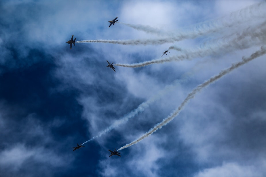 caption: The Blue Angels fly over Seattle during SeaFair weekend on Saturday, August 3, 2024.