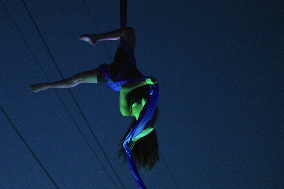 caption: Aerial, acrobatic, and flow artists perform during the Levity Arts Seattle Summer Series on Friday, August 16, 2024, at Gasworks Park in Seattle.
