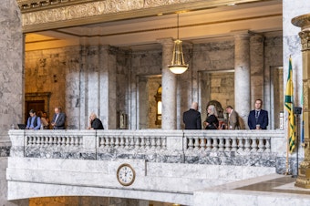 caption: Lobbyists and others in the Washington state Capitol on April 23, 2025.