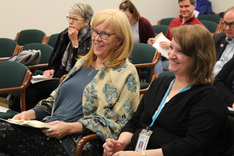 caption: Peggy Dolane, left, a mom with two kids with mental health issues, and Kathy Brewer, a Seattle Children's administrator and therapist.