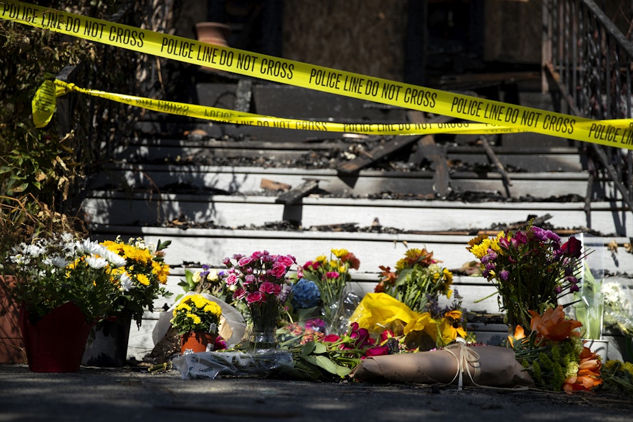 caption: A home near the intersection of North 48th Street and Whitman Avenue North, where two children and two adults were found deceased over the weekend, is shown on Tuesday, September 5, 2023, in the Wallingford neighborhood of Seattle.