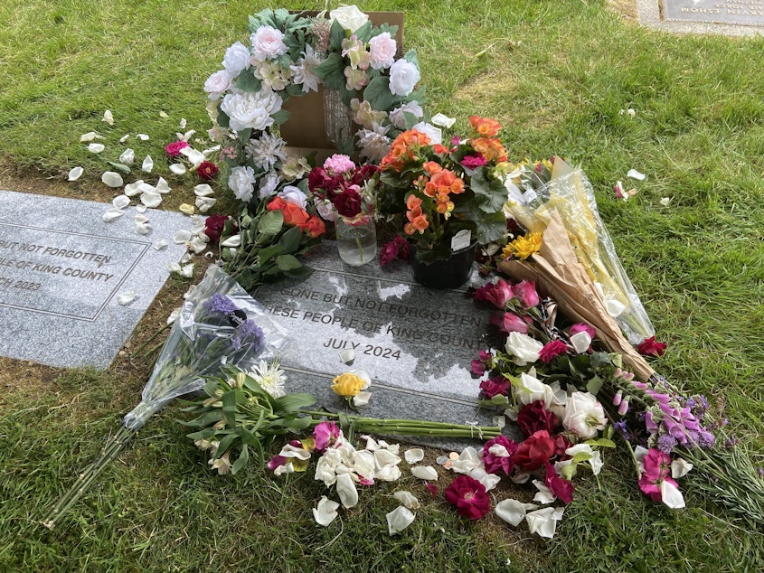 caption: During a indigent remains ceremony at Mt. Olivet Cemetery in Renton, Washington, the King County Medical Examiner's Office honored the lives of 405 residents.
