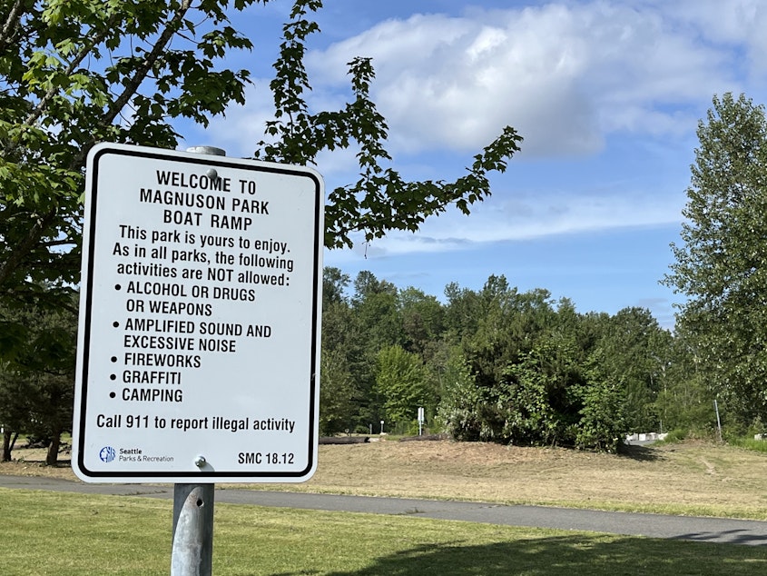 caption: Seattle has made physical changes to certain parks like new signage, lighting and gates to deter late-night parties.