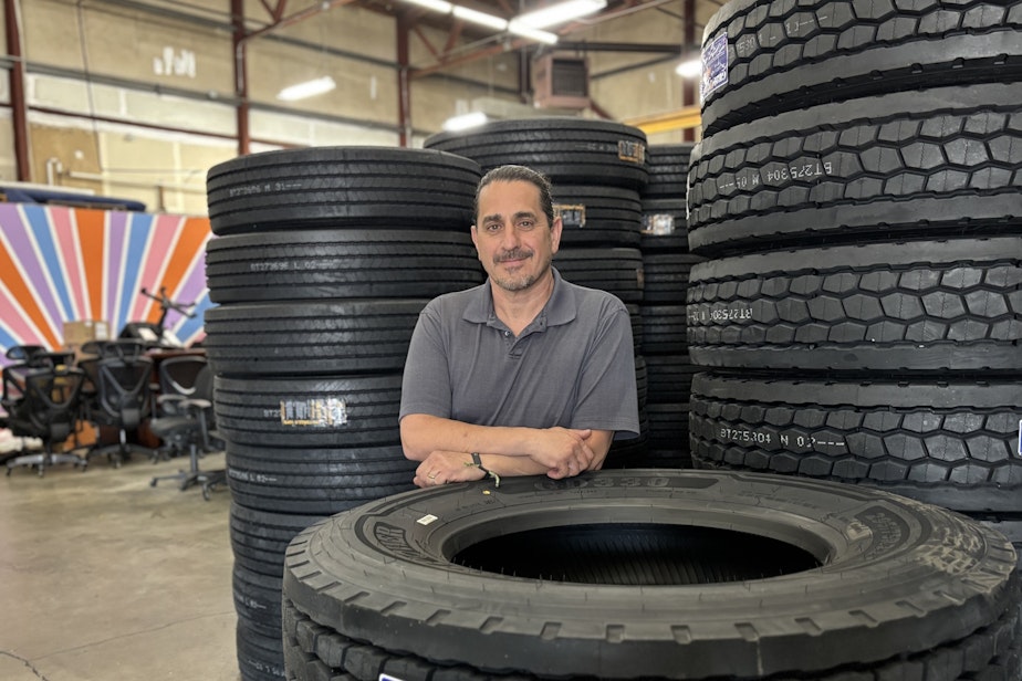 caption: Curt Nuccitelli owns Spirit Transport Systems in Kent Washington, which hauls shipping containers between local ports and local warehouses or stores.