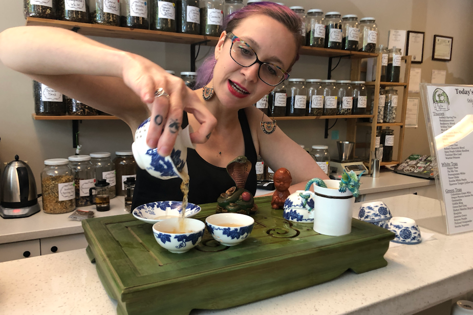 caption: Friday Elliott crafts tea blends based on pop culture -- from books to movies and music.